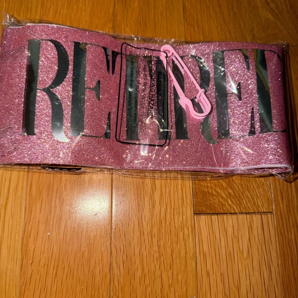 Retirement pink tiara and sash, includes box. Both are one size fits all. NWT